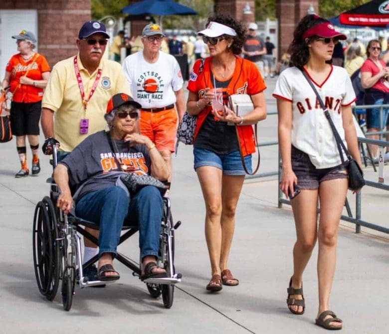 A group of people walking down the street.