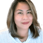 A woman with brown hair and green background